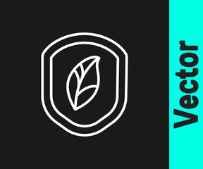 White line Shield with leaf icon isolated on black background. Eco-friendly security shield with leaf. Vector Illustration.