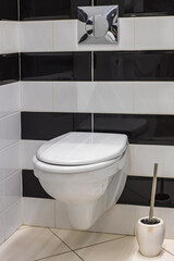 Toilet in the bathroom. Public or private toilet at home, airport, restaurant or cafe.