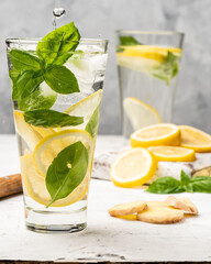 Ginger lemonade with basil in a highball glass.