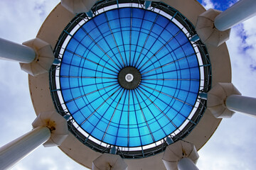 Blue glass transparent dome, bottom view at sunny day
