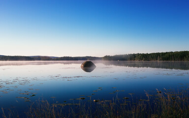 Blue Morning Landscape Reflected In The Forest Lake - 370596613