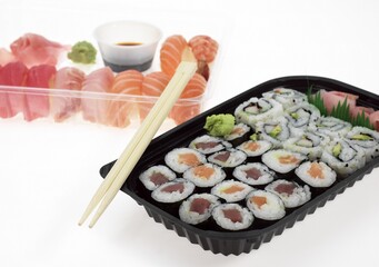 Sushi, California Roll and Maki, Japanese Food against White Background