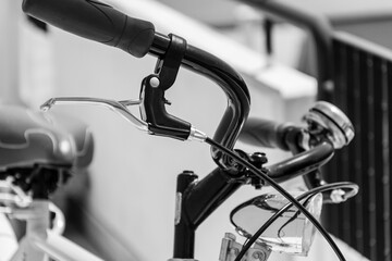  close up of bicycle in details, black and white photo