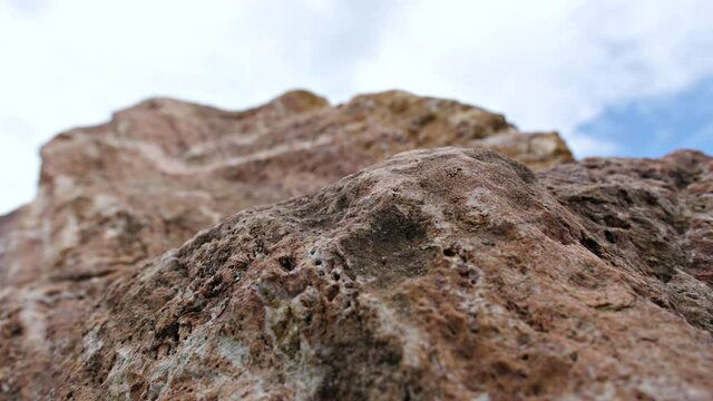 Close-up of raw brown rock, stone texture.