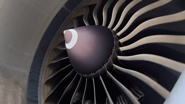 Jet engine blades of airplane rotating with wind.