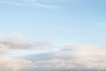Blue sky with clouds background with soft focus. Empty sky background for your design. Spring...