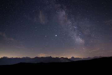 Night sky over mountain panorama with 9 four-thousand-metre peaks (incl Matterhorn) - obrazy, fototapety, plakaty