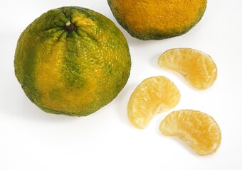 Ugly Grapefruit, citrus xtangelo, Fruits against White Background