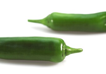 Green Chili Pepper, capsicum sp. against White Background