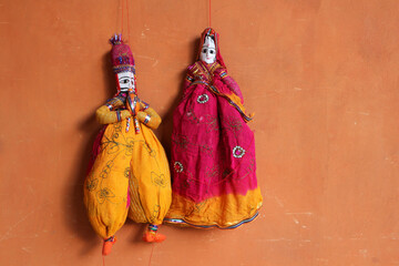 Indian traditional dolls on the wall in Jaipur.