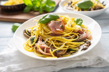 Italian pasta spaghetti prosciutto mushrooms parmesan and olive oil