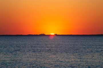 Naklejka premium Sonnenuntergang über Norderney