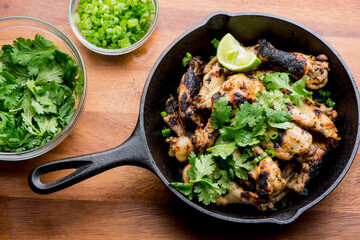 Grilled chicken. BBQ Chicken grilled in garlic and butter. Chicken, fried & served w/ bbq side dishes, organic vegetables and dressed in olive oil. Classic American outdoor grill entree favorite.