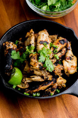 Grilled chicken. BBQ Chicken grilled in garlic and butter. Chicken, fried & served w/ bbq side dishes, organic vegetables and dressed in olive oil. Classic American outdoor grill entree favorite.