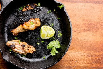 Grilled chicken. BBQ Chicken grilled in garlic and butter. Chicken, fried & served w/ bbq side dishes, organic vegetables and dressed in olive oil. Classic American outdoor grill entree favorite.