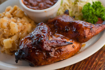Brisket, pork sausage, pork ribs, beef ribs. Barbecue platter served with classic bbq sides Mac n cheese, cornbread, Brussels sprouts, coleslaw & beer. Classic traditional Texas meats & side dishes.