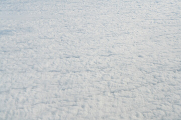 With solid white clouds. Texture for the background.