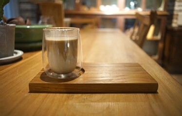 Iced Latte coffee in a grass