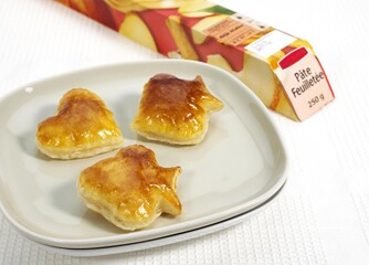 Crackers made with Puff or Flaky Pastry against White Background