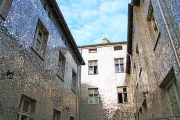 Building with mirrored walls. Facade of building made of mirror fragments