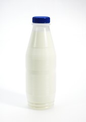 Bottle of Milk against White Background
