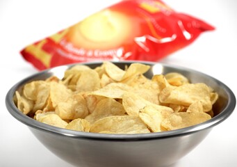 Potato Chips against White Background