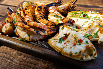 
Delicious grilled seafood. Shrimp squid and scallops