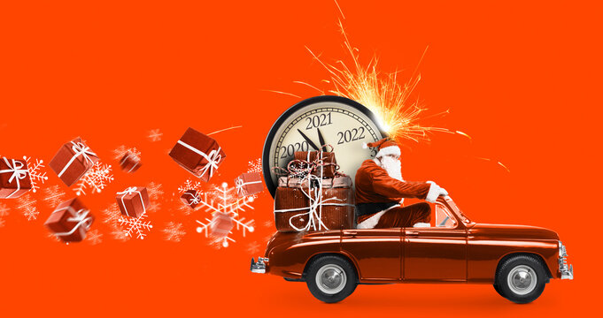 Christmas is coming. Santa Claus on toy car delivering New Year 2021 gifts and countdown clock at orange background with fireworks