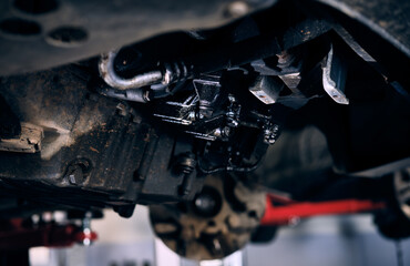 Fototapeta na wymiar Car motor element close up view. Workshop work, repair concept
