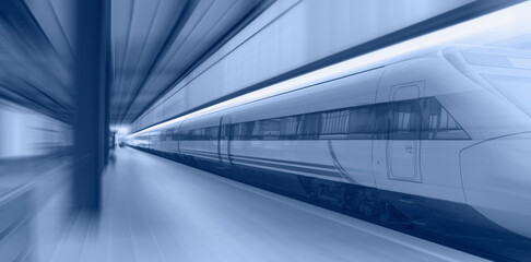Obraz premium High speed train runs on rail tracks . Train in motion