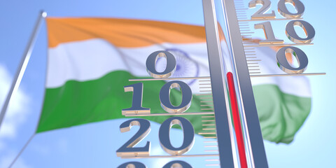 Thermometer shows 0 zero air temperature near waving flag of India. Weather forecast conceptual 3D rendering