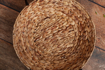 Digital backdrop for newborn photo shoot. Wicker basket on wooden background. 