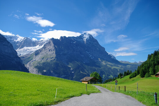 Sunny day view to the mountains vally and Mittelhorn and Mattenberg summit from road to First (Grindelwald)  (Jungfrau region, Bern, Switzerland)