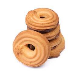 Heap of butter ring cookies with chocolate glaze on the back side