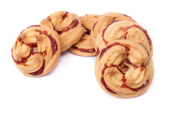 Group of shortbread cookies decorated with jam
