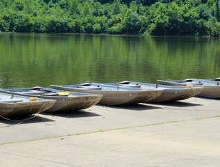 The rowboats at the lake on a sunny day.
