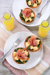 Breakfast. Bun with cheese, spinach, ham