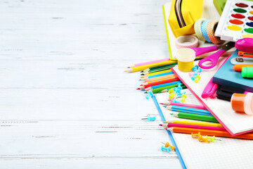 School supplies on white wooden table