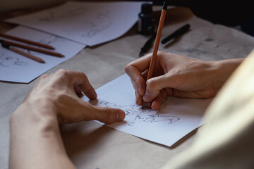 Drawing, sketching the human figure with a ink nib pen