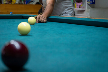 People in table pool game