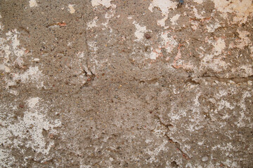 photo of an old peeling wall, cement coating. Texture