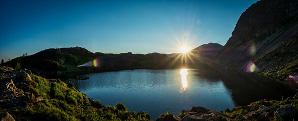 sunrise over the lake in the mountains