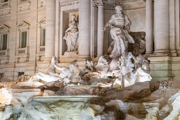 Fototapeta na wymiar Night at Trevi Fountain, a famous fountain in the Trevi district in Rome, Italy.