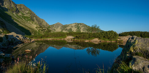 mountain lake in the mountains witch reflection