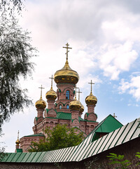 golden domes of an Orthodox church against the sky