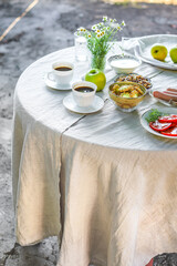 coffee and breakfast on the table outdoor tea party, coffee break outdoor food background top view copy space for text organic healthy eating