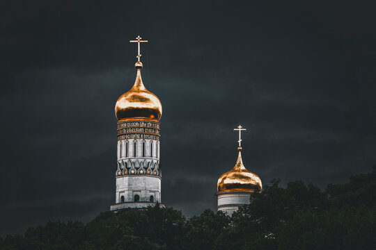 Mystical Christian Church against the dark background of the heavens. Ivan the Great bell tower in Moscow