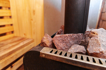 Interior details of traditional Finnish sauna steam room. Traditional old Russian bathhouse SPA Concept. Relax country village bath concept.