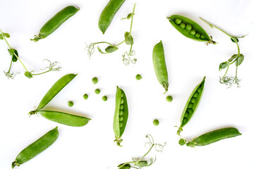 Flat lay natural light green snap peas isolated on white . High quality photo