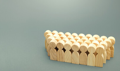 A large group of people are standing in the formation. Recruiting staffing. Search for candidates...